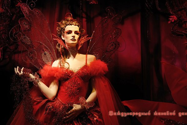 Glamour chic chica en rojo en la mascarada