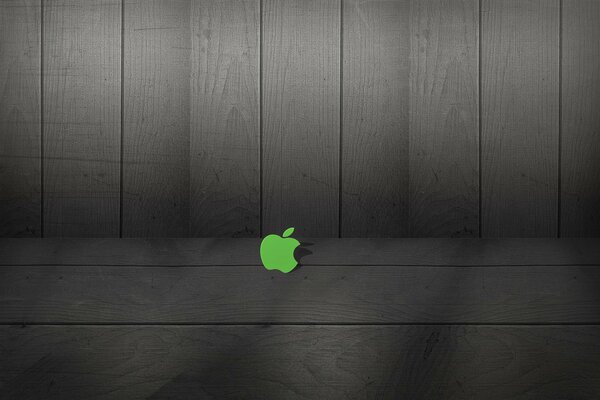 Logotipo verde de apple en el fondo de las pizarras