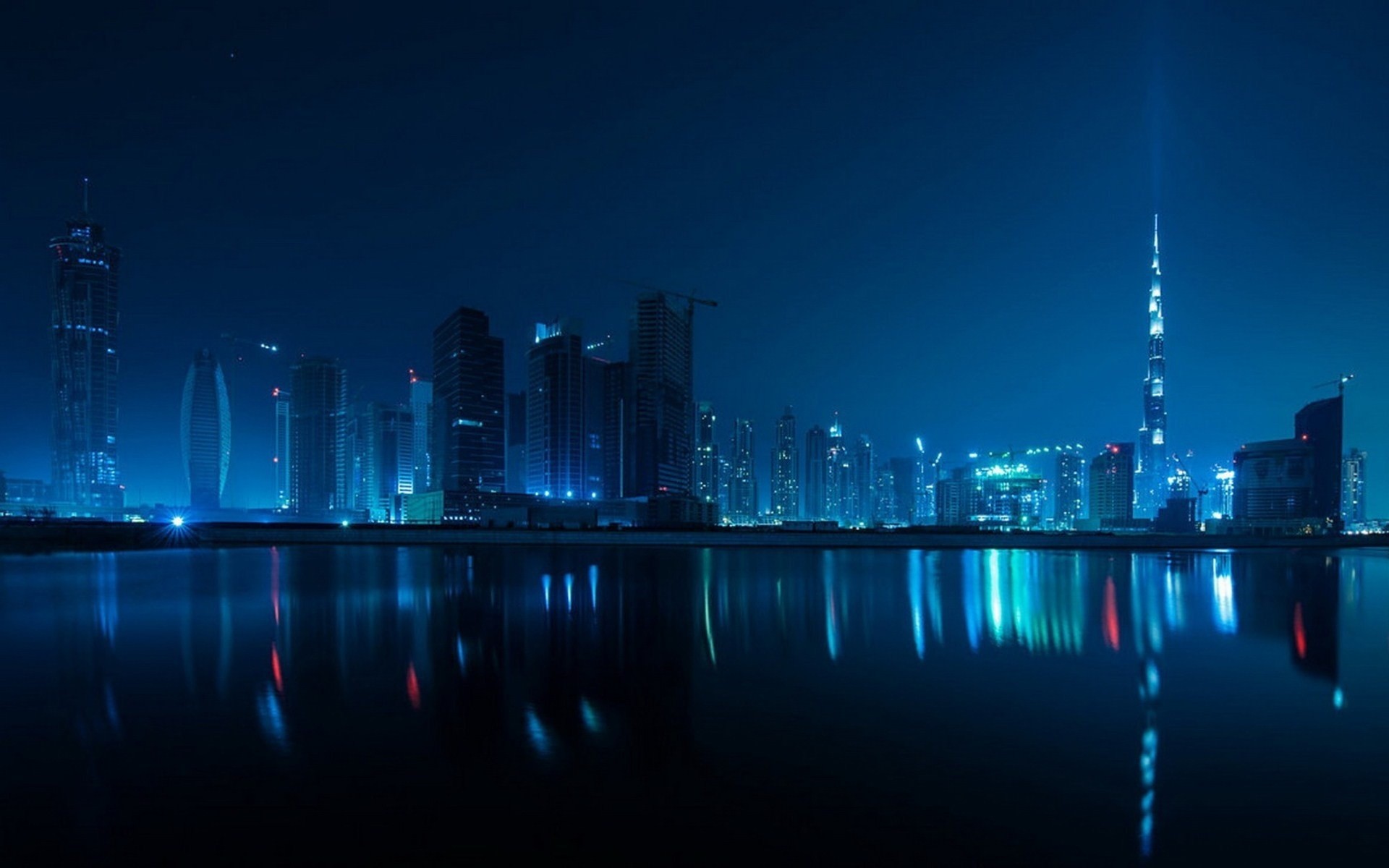 luces dubai árboles noche