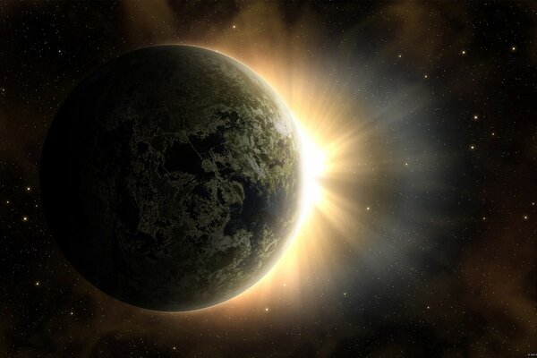 Amanecer, el planeta tierra y el sol