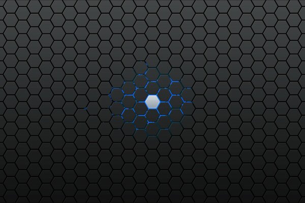 Punto de hexágono luminoso sobre un fondo de panal gris