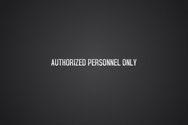 Inscripción personal autorizado sobre fondo negro