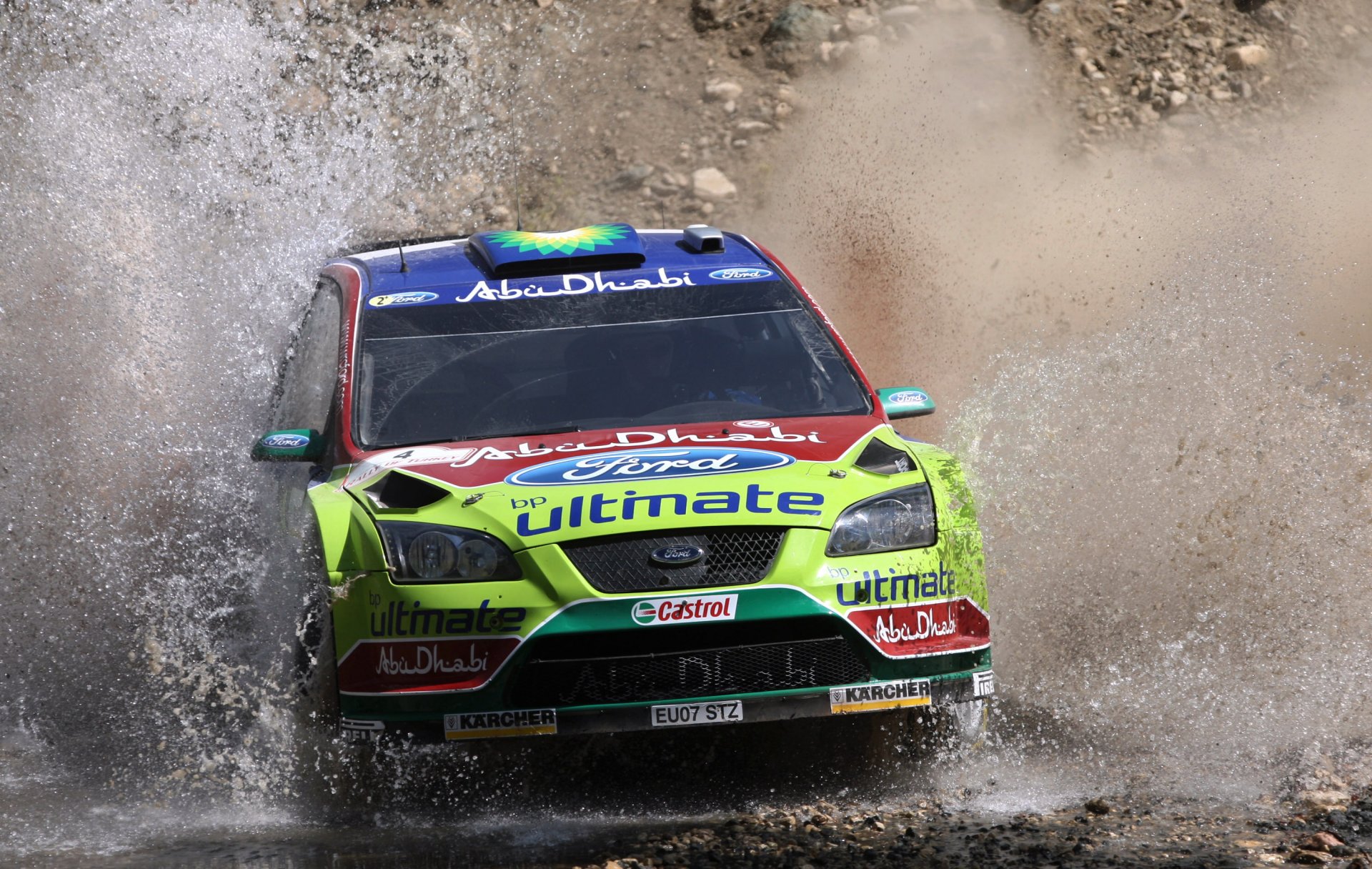 ford enfoque auto wrc rally frente coche agua salpicaduras deporte carrera faros logotipo