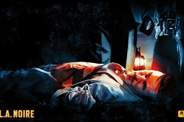 Cartel del juego L. A. Noire de Rockstar Games con un cadáver tirado