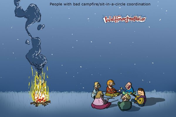 Picnic por la noche en una fogata caliente