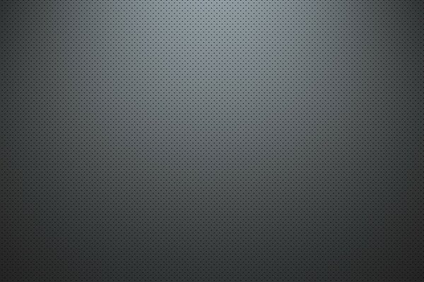 Puntos negros sobre fondo gris-blanco