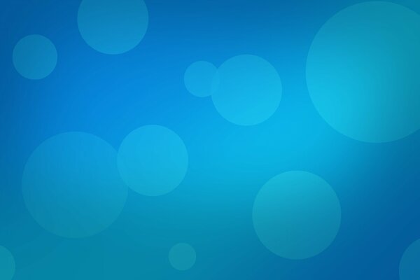 Círculos azules de diferentes tamaños sobre fondo azul