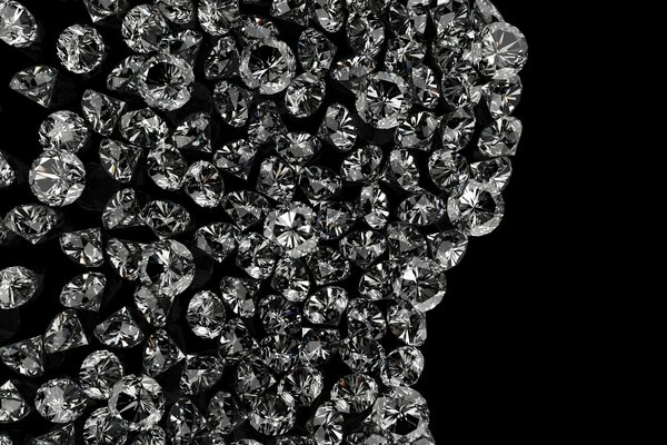 Un montón de piedras preciosas sobre un fondo negro
