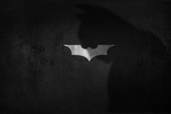 Logotipo de la sombra de Batman en el fondo del murciélago