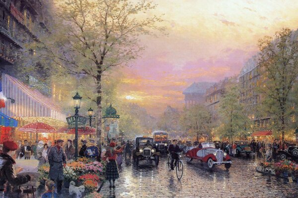 Boulevard de la tarde en Francia con linternas y coches