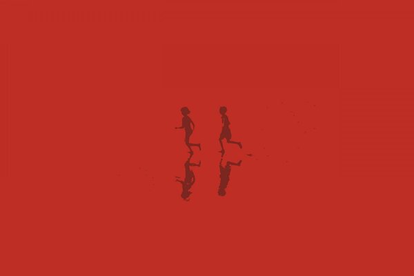 Reflejos de siluetas de niños corriendo sobre un fondo rojo