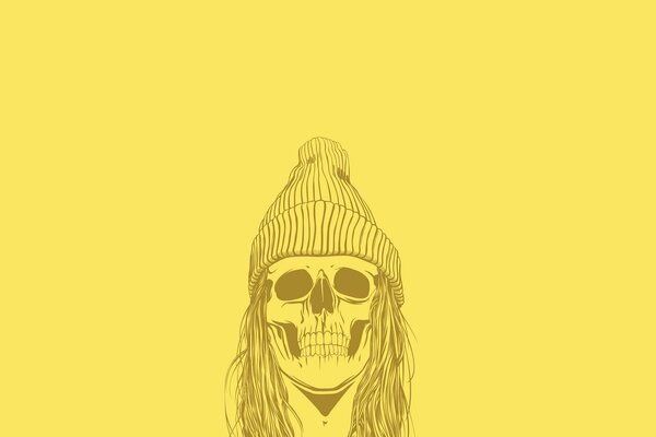 Cráneo con sombrero sobre fondo amarillo