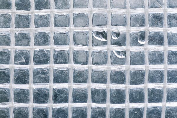 Gotas de agua en una textura cuadrada