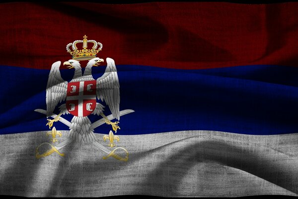 Hermoso escudo de armas en la bandera de Rusia