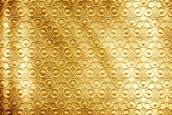 Patrón de metal dorado en el fondo