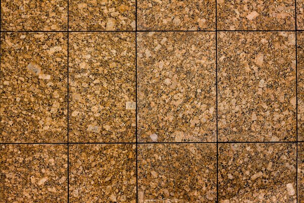 Azulejo de mármol de color marrón