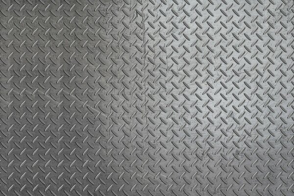 Fondo gris bajo metal con arañazos