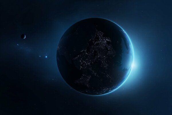 Un planeta con un satélite, con las luces de la civilización en la superficie contra el fondo de una estrella en ascenso