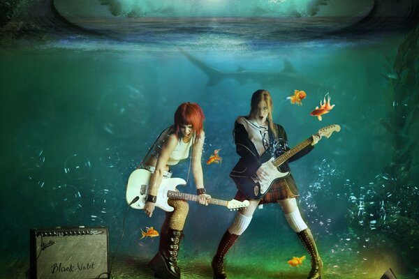 Concierto de chicas con guitarras bajo el agua