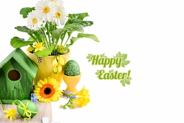 Fiesta de la Santa Pascua, huevos sobre la mesa y gerberas festivas
