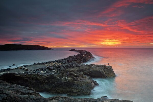 Puesta de sol del mar para dos
